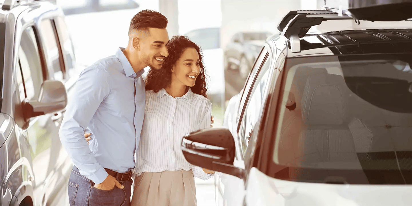 Young-couple-car-buying-2-stock