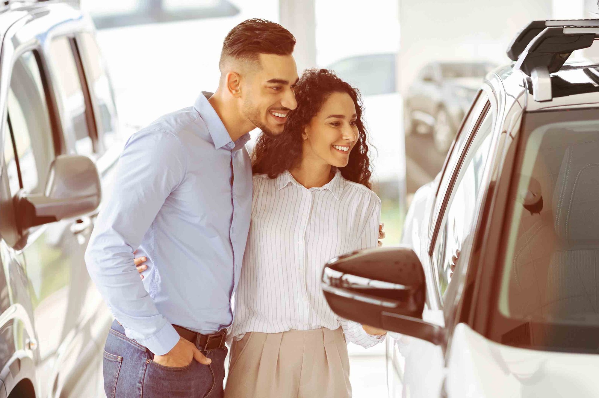 Young-couple-car-buying-2-stock