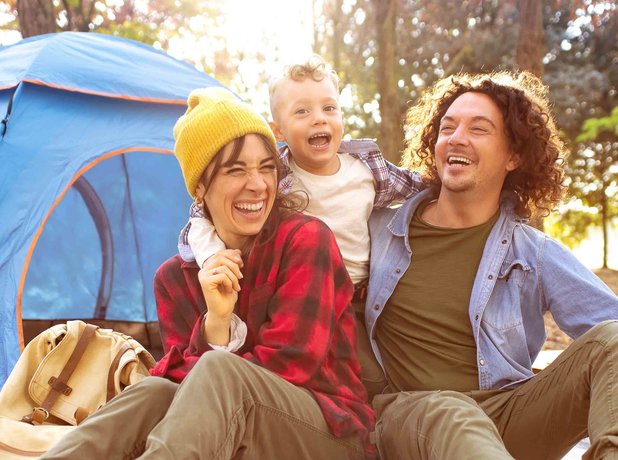 young-family-kid-camping-travel-stock