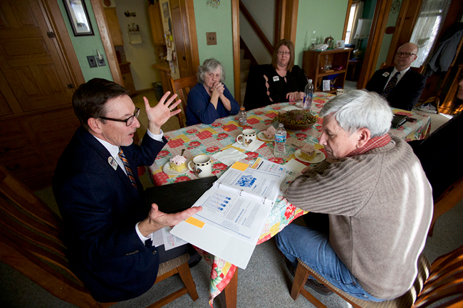 Dupaco member Linda Jackson hosts Dupaco President/CEO Joe Hearn and Iowa State Rep. Andy McKean