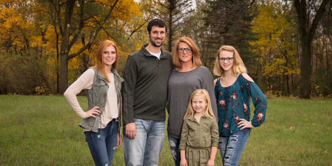 Dupaco members Alicia and Patrick Damveld saved thousands by bringing their auto loans to their credit union. They used the savings to buy a camper to take daughters Taylor (from left), Teagan and Ireland on vacations across the country. (D. Phillips photo)