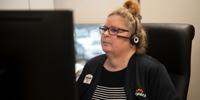 Dupaco Insurance Services’ Chris Rogers works on her computer at Dupaco’s Pennsylvania Avenue branch in Dubuque, Iowa. (M. Blondin/Dupaco photo)