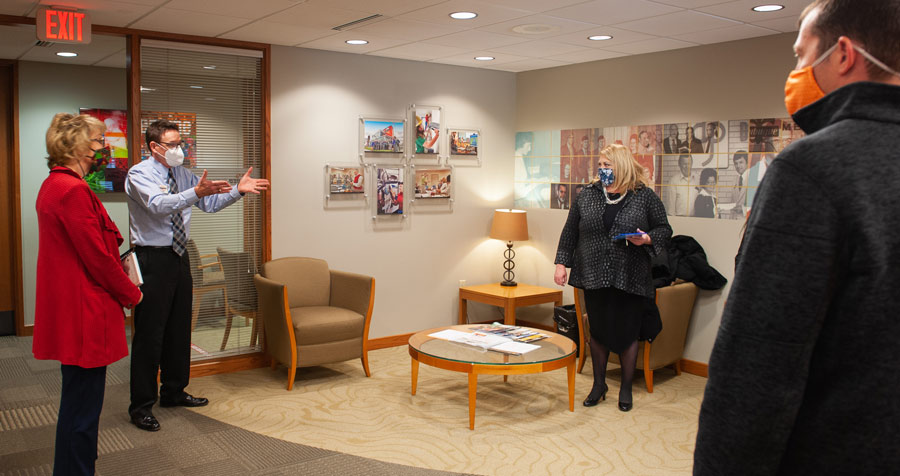 Jo Eckert and Jayne Armstrong from the Iowa District Office of the SBA speak with Dupaco's President/CEO Joe Hear