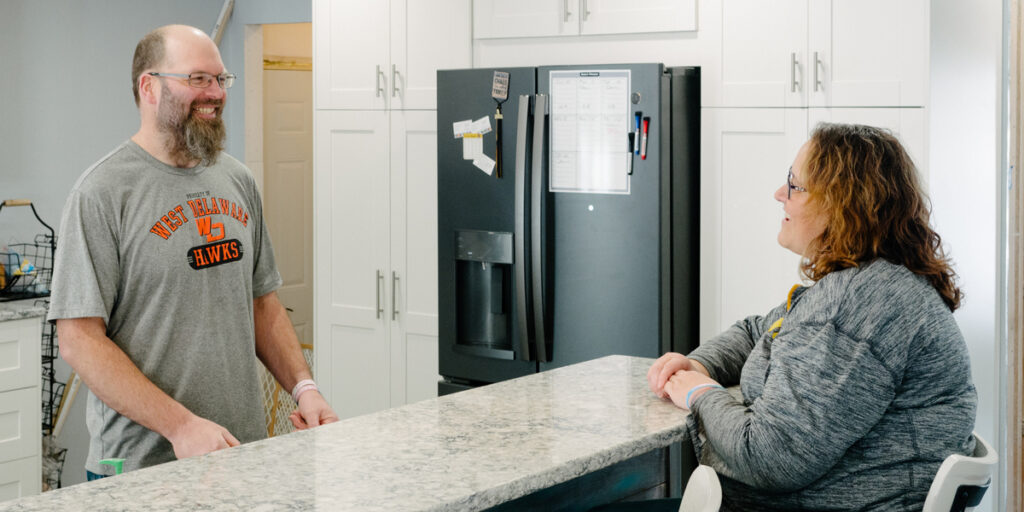 Members Ned and Stacey Smith enjoy their newly renovated kitchen in rural Manchester, Iowa. (B. Kaplan photo)