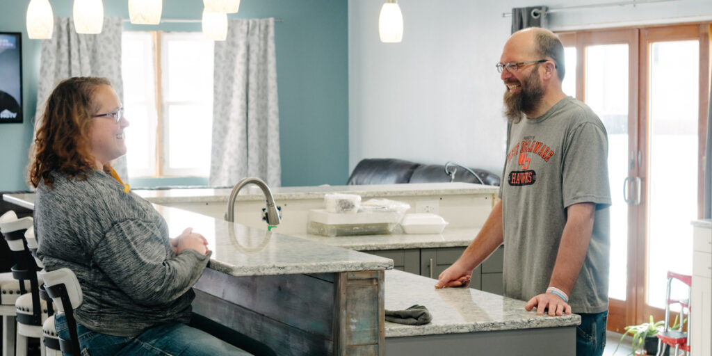 Members Ned and Stacey Smith enjoy their newly renovated kitchen in rural Manchester, Iowa. (B. Kaplan photo)