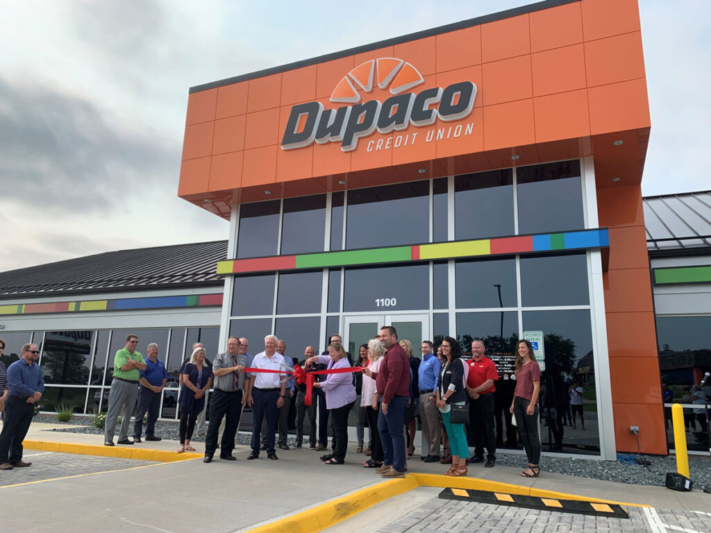 Dupaco staff, Platteville Chamber of Commerce representatives, and elected officials Wednesday evening celebrate the re-opening of the credit union’s newly remodeled Learning Lab Branch Office in Platteville, Wis. (D.Klavitter photo)