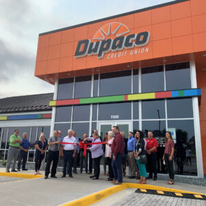 Dupaco staff, Platteville Chamber of Commerce representatives, and elected officials Wednesday evening celebrate the re-opening of the credit union’s newly remodeled Learning Lab Branch Office in Platteville, Wis. (D.Klavitter photo)