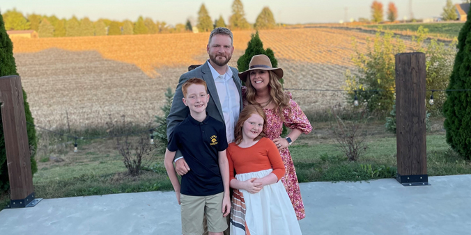 Dupaco members Ben and Brianna Umthun, of Norwalk, Iowa, have long connected with their credit union from a distance. Soon the family, which includes children Carson and Cami, can also visit Dupaco in person at the Grimes Learning Lab.