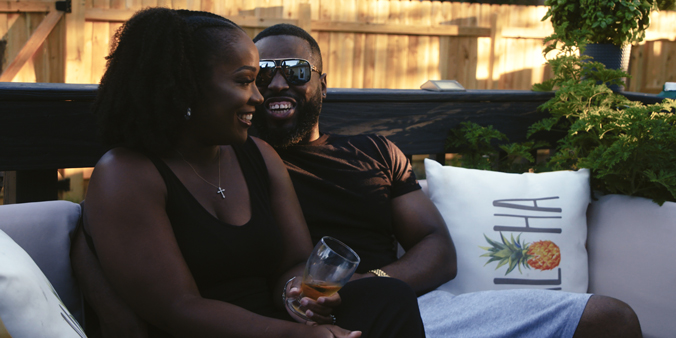 Leroy and Brittany Sisk enjoy spending time in their newly enclosed backyard. (DreamCatcher photo)