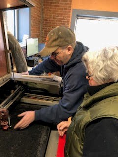 Brian Graham gives Gail Chavenelle a tour of Key City Creative Center