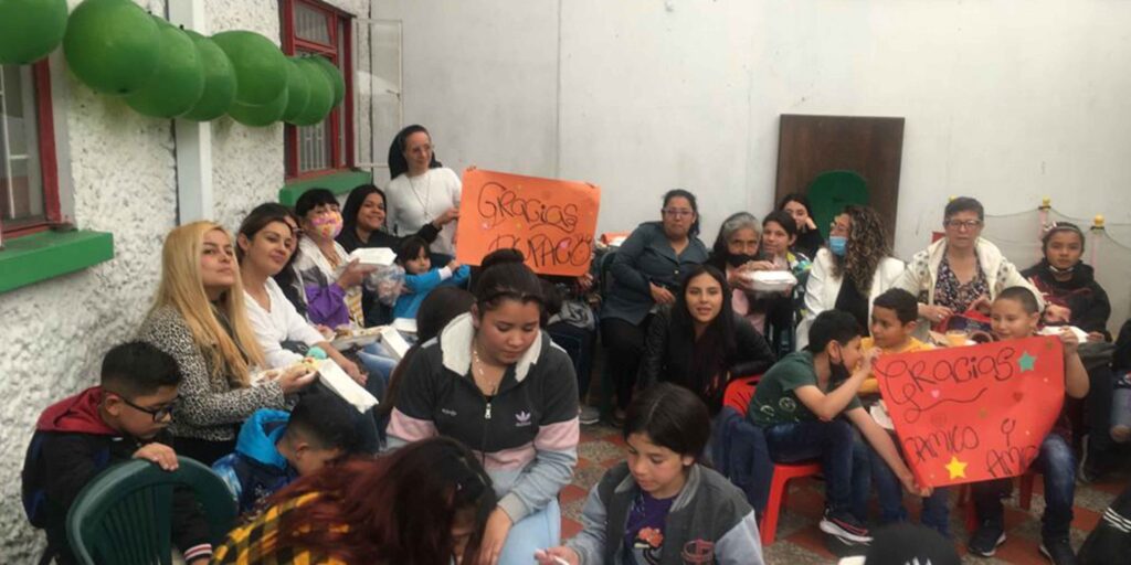 Children holding signs thanking Dupaco